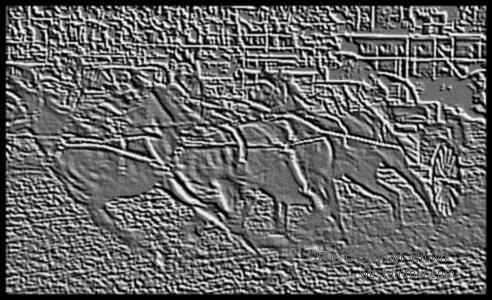 Honest  Mur's Chuckwagon, 
etched in stone.  (31 kb)